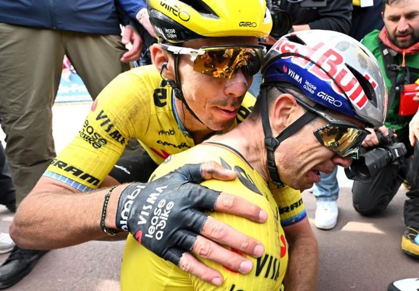 Team Visma - Lease a Bike's French rider Christophe Laporte (L) congratulates winner Team Visma - Lease a Bike's Belgian rider Wout van Aert at the end of the 123rd edition of the Paris-Roubaix one-day classic cycling race, 258.3 km between Compiègne and Roubaix, at the Vélodrome André-Pétrieux in Roubaix, northern France, on April 12, 2026. Etienne GARNIER / POOL / AFP