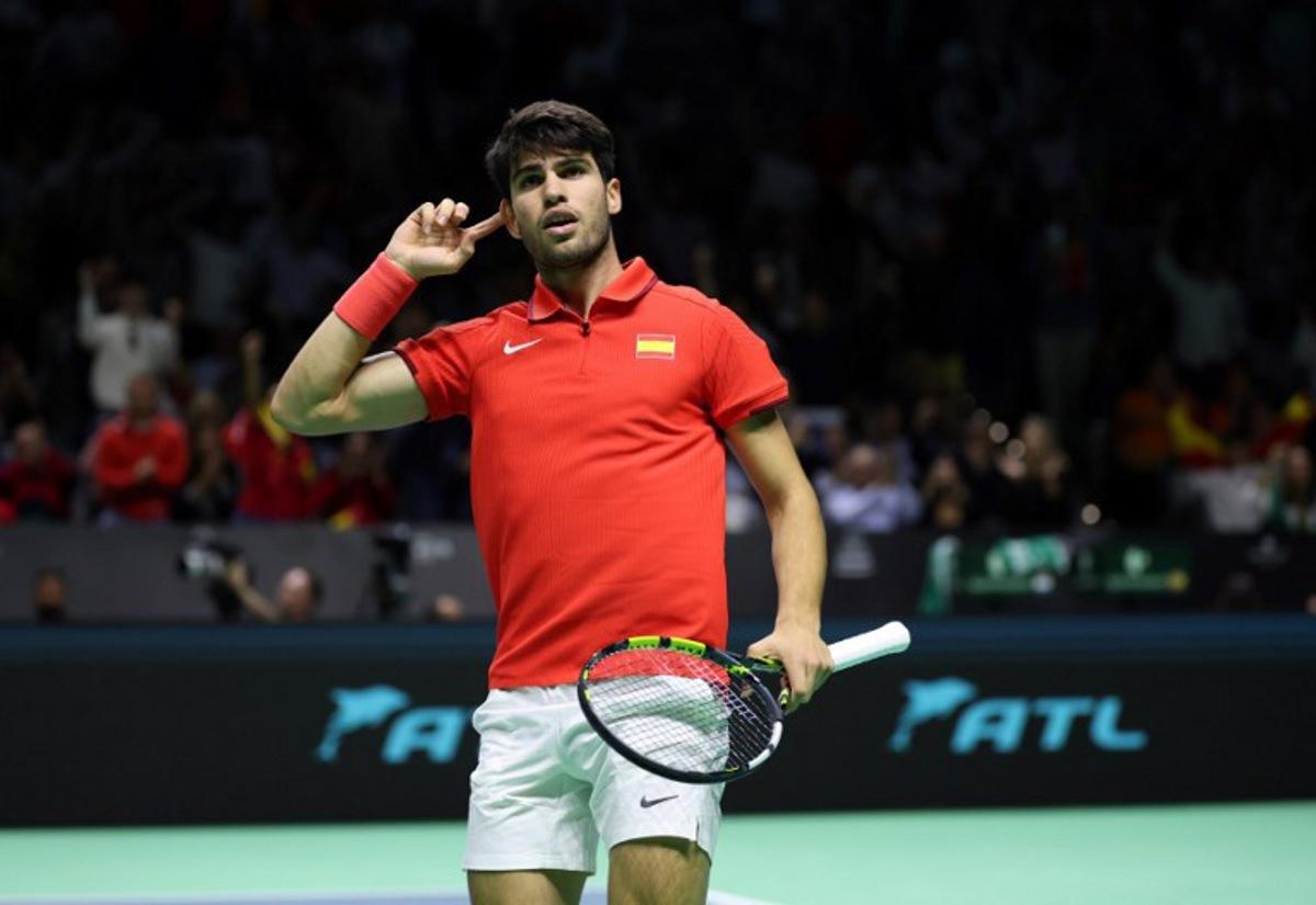 Spain's Carlos Alcaraz reacts in the quarter-final doubles match between Netherlands and Spain during the Davis Cup Finals at the Palacio de Deportes Jose Maria Martin Carpena arena in Malaga, southern Spain, on November 19, 2024. Thomas COEX / AFP