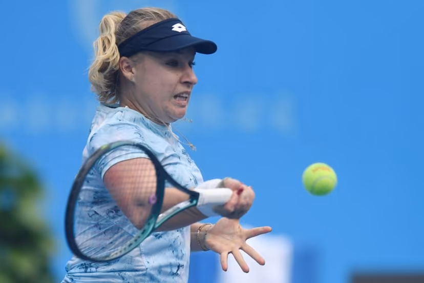 Russia's Anna Blinkova hits a return to Czech Republic's Dominika Salkova during their women's singles semi-final match at the Jiangxi Open tennis tournament in Jiujiang, central China's Jiangxi province on November 1, 2025.  STR / AFP