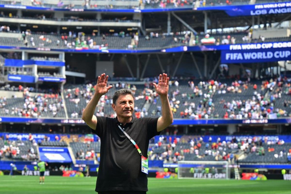 Iran's head coach Amir Ghalenoei celebrates at the end of the 2026 World Cup Group G football match between Belgium and Iran at the Los Angeles Stadium in Inglewood on June 21, 2026. Frederic J. Brown / AFP