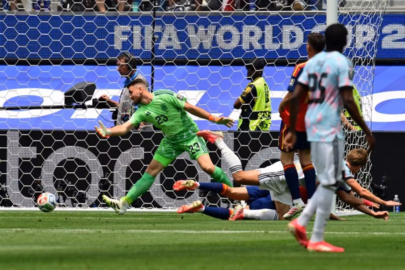 Belgium's forward #17 Charles De Ketelaere (R) scores his team's first goal during the 2026 World Cup football tournament quarter-final match between Spain and Belgium at the Los Angeles Stadium in Inglewood on July 10, 2026. Frederic J. Brown / AFP