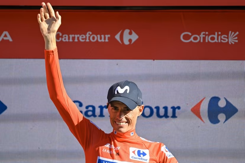 Team Movistar's Spanish rider Enric Mas celebrates reatining the overall race lead on the podium after the 18th stage of the Vuelta a Espana 2026 cycling tour, a 32,1 km individual time-trial race between El Puerto de Santa Maria and Jerez de la Frontera, on September 10, 2026. JORGE GUERRERO / AFP