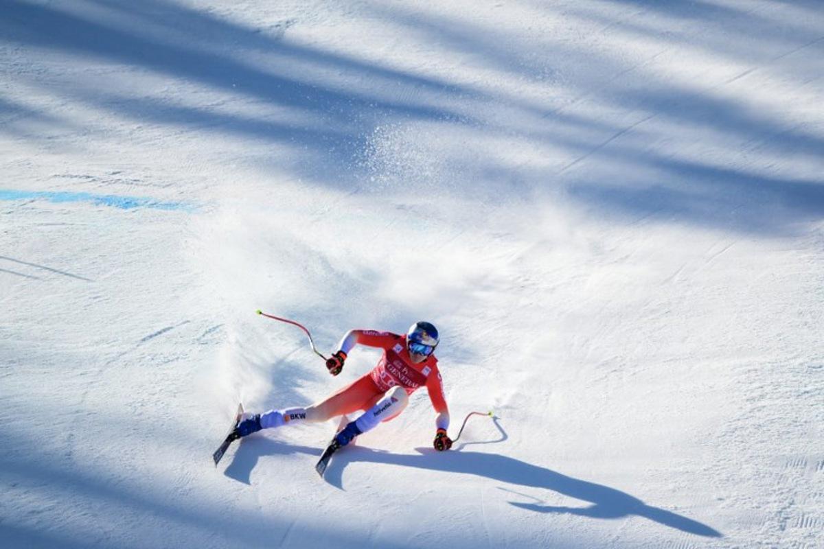 Switzerland's Marco Odermatt competes in the Men's Downhill event of the FIS Alpine World Cup in Courchevel in the French Alps on March 13, 2026. Olivier CHASSIGNOLE / AFP