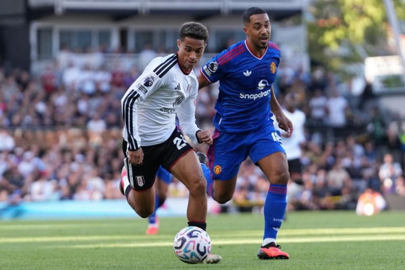 Fulham's English midfielder #24 Josh King (L) vies with Manchester United's Belgian midfielder #18 Youri Tielemans (R) during the English Premier League football match between Fulham and Manchester United at Craven Cottage in London on September 20, 2026. CARLOS JASSO / AFP
