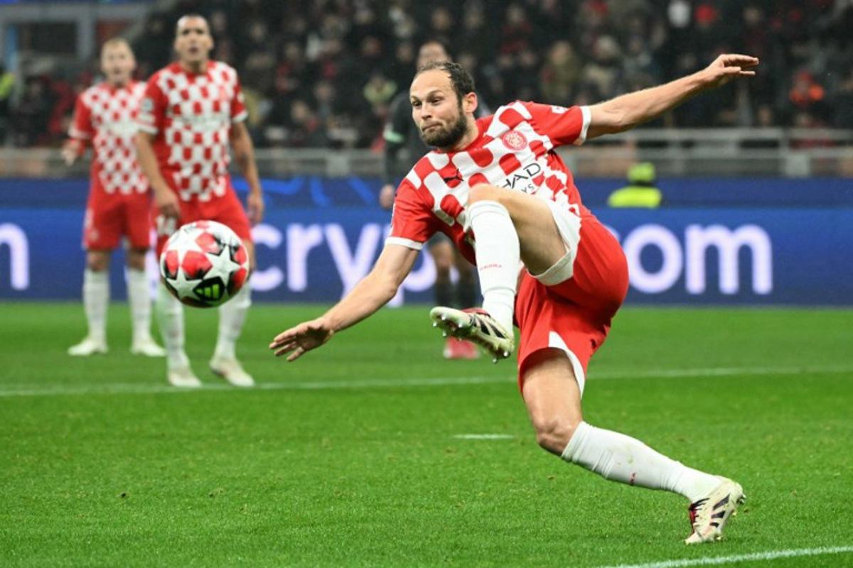 Girona's Dutch defender #17 Daley Blind kicks the ball during the UEFA Champions League football match between AC Milan and Girona at San Siro stadium in Milan, on January 22, 2025. Alberto PIZZOLI / AFP
