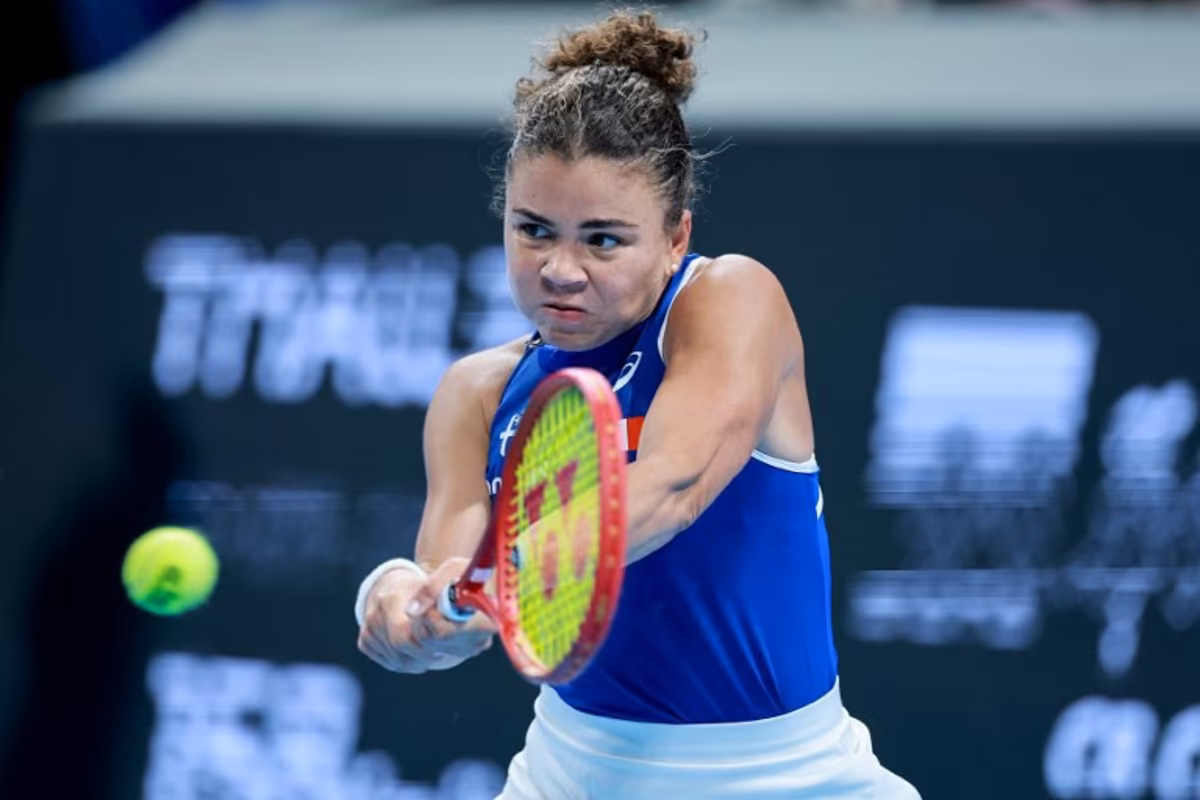 Italy's Jasmine Paolini hits a return to China's Zheng Qinwen during their women's singles quarter-final match at the Billie Jean King Cup tennis tournament in Shenzhen, southern China's Guangdong province on September 24, 2026. CN-STR / AFP