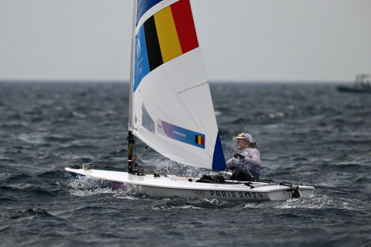 Belgium's Emma Plasschaert competes in the medal race of the women's ILCA 6 single-handed dinghy event during the Paris 2024 Olympic Games sailing competition at the Roucas-Blanc Marina in Marseille on August 7, 2024. Christophe SIMON / AFP