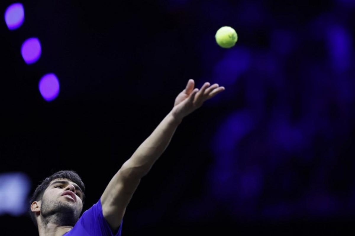 Spain's Carlos Alcaraz of Team Europe serves the ball to USA's Taylor Fritz of Team World during their 2024 Laver Cup men's singles tennis match in Berlin, Germany on September 22, 2024. Odd ANDERSEN / AFP