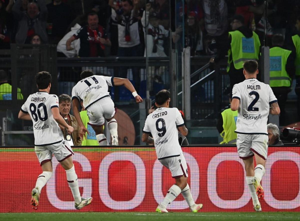 Bologna's Swiss forward #11 Dan Ndoye celebrates after scoring a goal during the Italian Cup (Coppa Italia) final football match between AC Milan and Bologna at the Olympic stadium in Rome, on May 14, 2025. Isabella BONOTTO / AFP