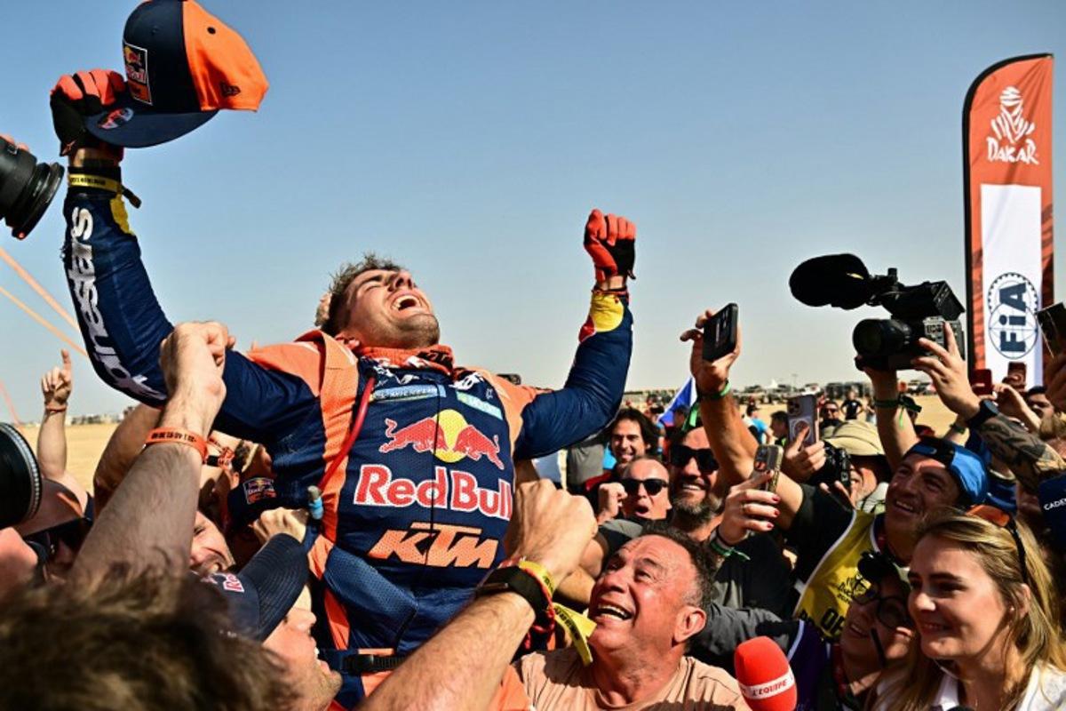 Argentine rider Luciano Benavides with a Ktm 450 Rally Factory celebrates after winning the 48th edition of the Dakar Rally 2026 in Yanbu, Saudi Arabia, on January 17, 2026. Giuseppe CACACE / AFP