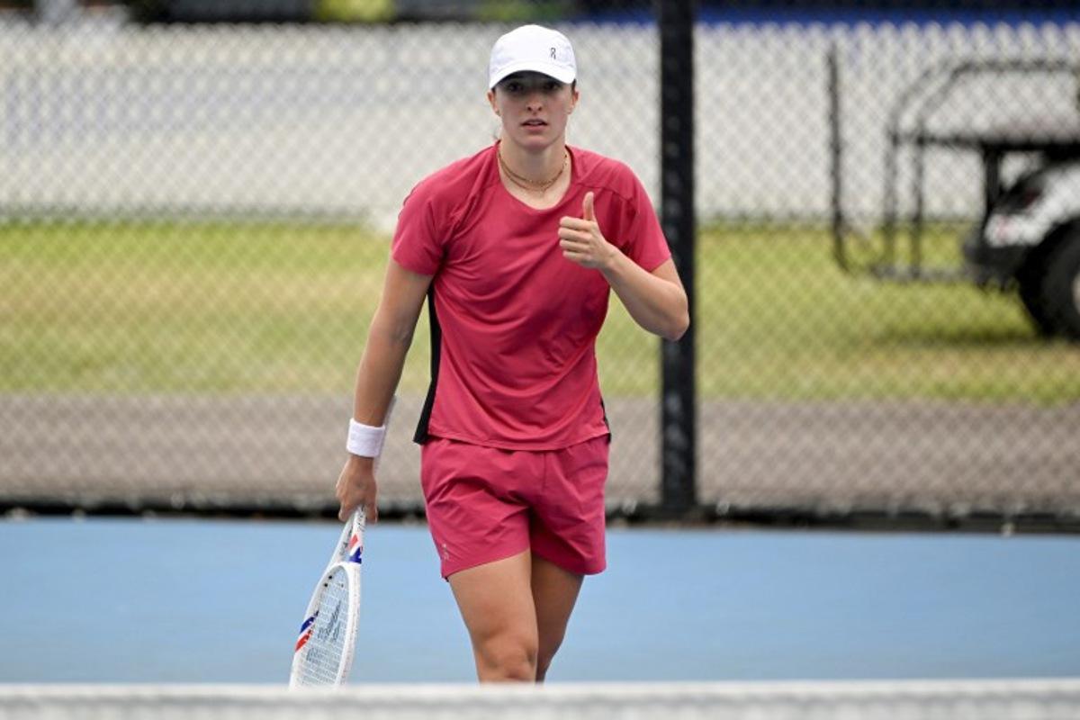 Poland's Iga Swiatek gestures during a practice session ahead of the United Cup tennis tournament in Sydney on January 2, 2026. Saeed KHAN / AFP
