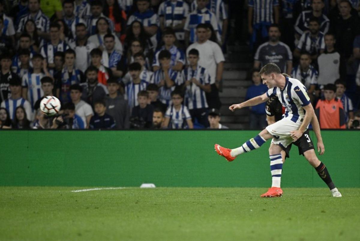Real Sociedad's Spanish forward #17 Sergio Gomez scores his team's first goal during the UEFA Europa League 1st round day 1 football match between Real Sociedad and AFC Bournemouth at Anoeta Stadium in San Sebastian on September 17, 2026. ANDER GILLENEA / AFP