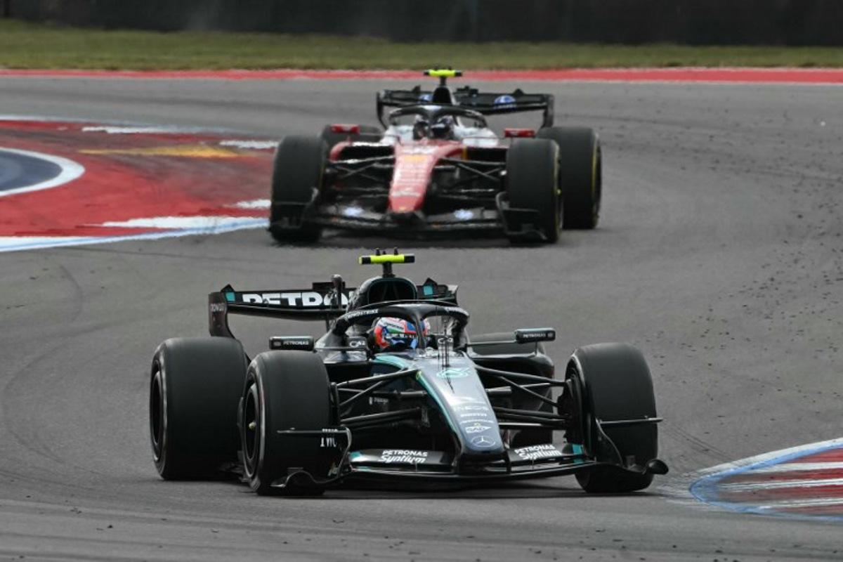 Mercedes' Italian driver Kimi Antonelli races ahead of Ferrari's British driver Lewis Hamilton during the United States Formula One Grand Prix at the Circuit of the Americas in Austin, Texas, on October 25, 2026. RONALDO SCHEMIDT / AFP