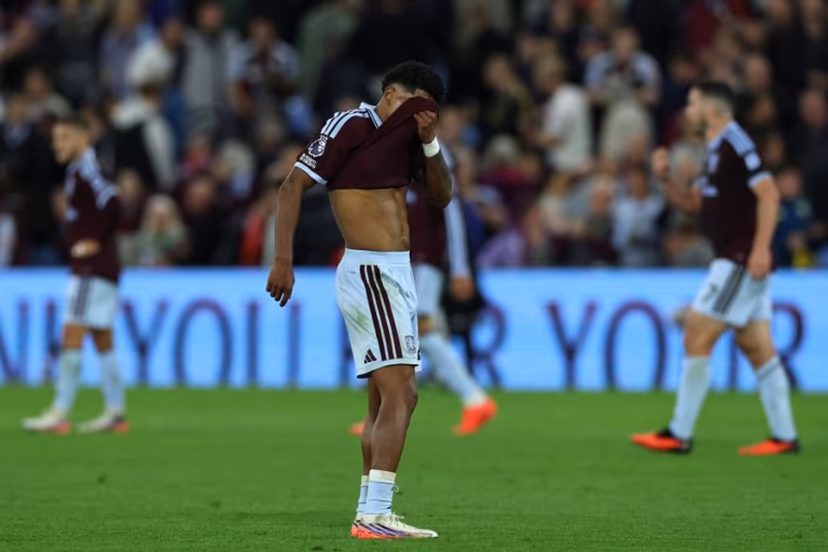 Aston Villa's Dutch defender #22 Ian Maatsen reacts to their defeat after the English Premier League football match between Aston Villa and Arsenal at Villa Park in Birmingham, central England on August 31, 2026. Arsenal won the game 1-0. Darren Staples / AFP