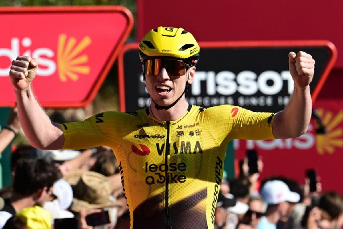 Team Visma-Lease a bike's British rider Matthew Brennan celebrates winning the second stage of the Vuelta a Espana 2026, a 214.3 km race between Monaco and Manosque on August 23, 2026. Miguel MEDINA / AFP