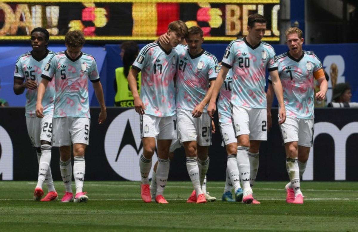 Belgium's forward #17 Charles De Ketelaere celebrates scoring his team's first goal with teammates during the 2026 World Cup football tournament quarter-final match between Spain and Belgium at the Los Angeles Stadium in Inglewood on July 10, 2026. Patrick T. Fallon / AFP