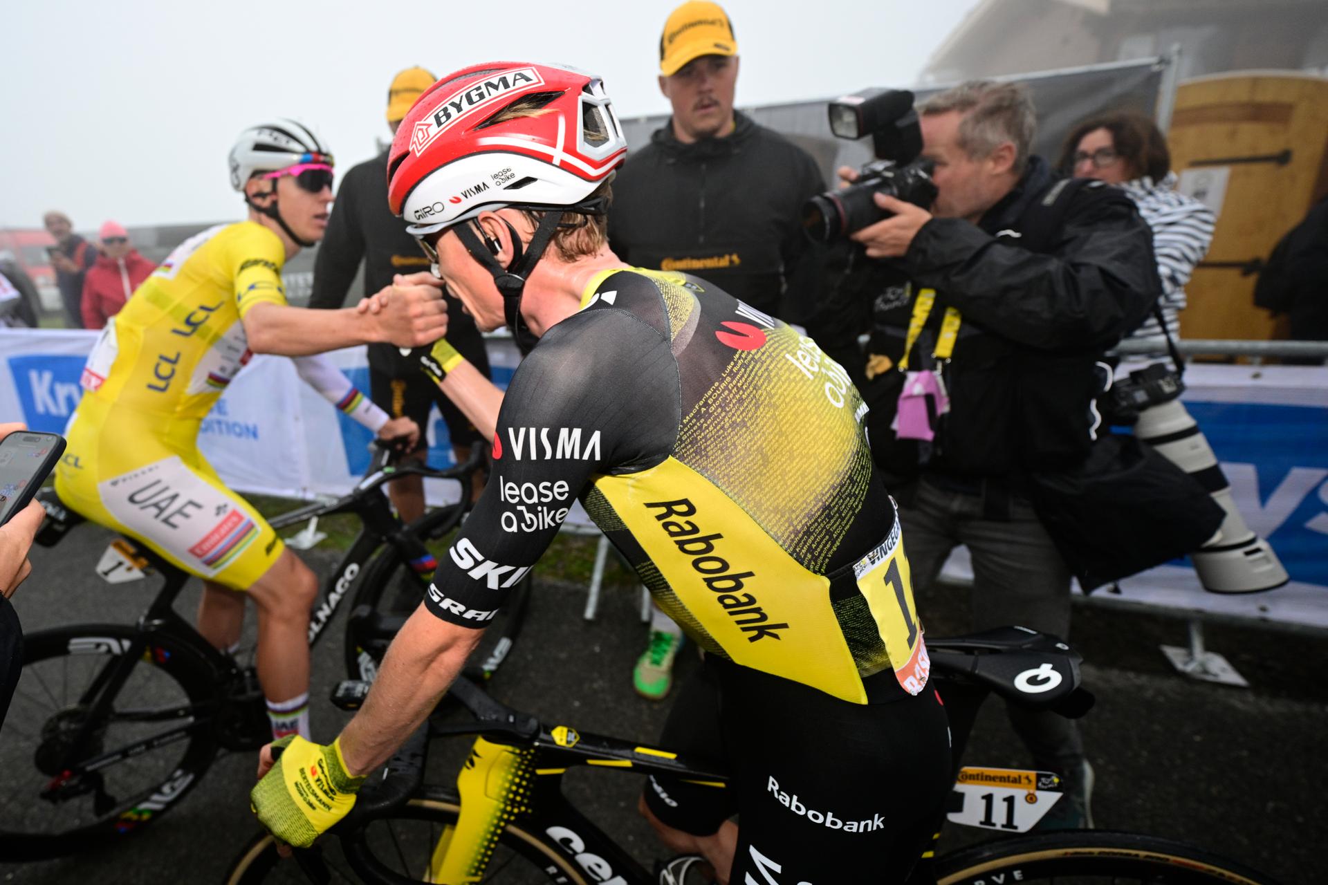 Slovenian Tadej Pogacar of UAE Team Emirates shake hands with Danish Jonas Vingegaard Hansen of Team Visma-Lease a Bike after finishing the stage 18 of the 2025 Tour de France cycling race, from Vif to Courchevel Col de la Loze, on Thursday 24 July 2025 in France. The 112th edition of the Tour de France starts on Saturday 5 July in Lille, France, and will finish in Paris, France on the 27th of July. BELGA PHOTO DIRK WAEM