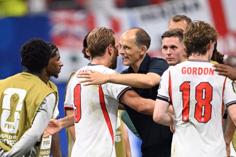 England's forward #09 Harry Kane celebrates with England's German head coach Thomas Tuchel after winning the 2026 World Cup round of 32 match football between England and the Democratic Republic of Congo at the Atlanta Stadium in Atlanta on July 1, 2026. ROBERTO SCHMIDT / AFP