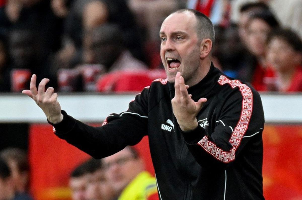 Leipzig's German head coach Ole Werner reacts from the sidelines during the German first division Bundesliga football match between Bayer 04 Leverkusen and RB Leipzig in Leverkusen, western Germany, on May 2, 2026. UWE KRAFT / AFP