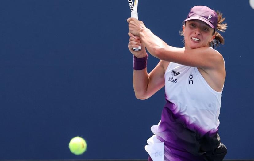 Poland's Iga Swiatek hits a return to Argentina's Nadia Podoroska during their women's singles second round tennis match on day five of the US Open tennis tournament at the USTA Billie Jean King National Tennis Center in New York City on September 3, 2026. TIMOTHY A. CLARY / AFP