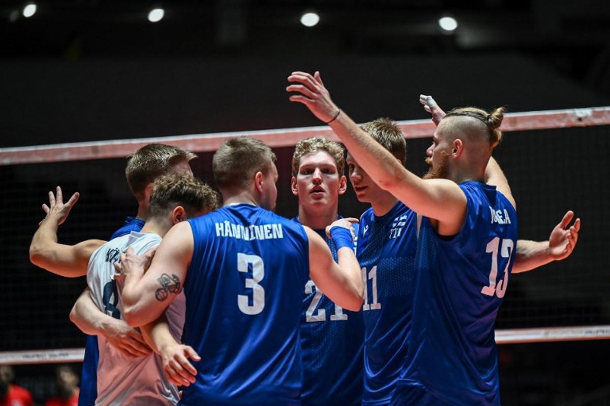 Members of Finland celebrate after a point during the match between Finland and Egypt on the final day of the Volleyball World Cup 2023 men's Olympic qualifying tournament at Yoyogi National Stadium in Tokyo on October 8, 2023. Richard A. Brooks / AFP