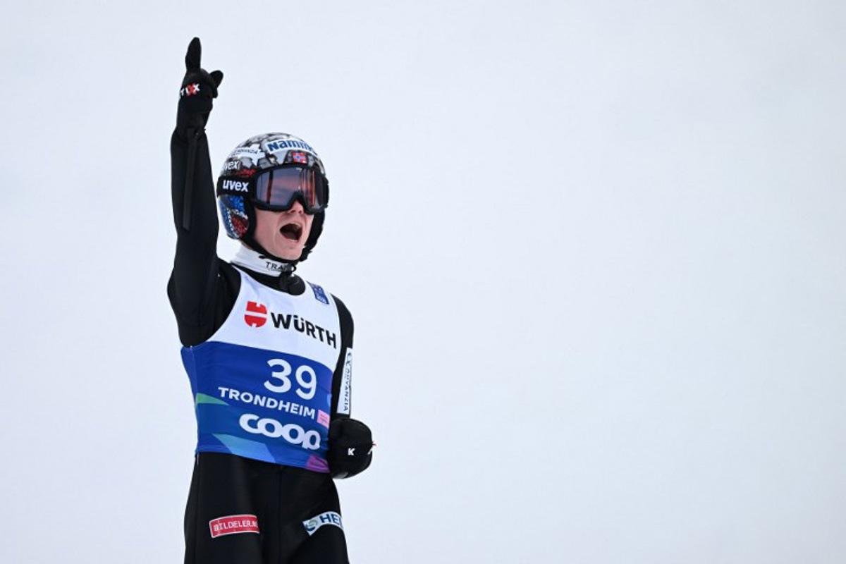 Norway's Marius Lindvik reacts after his jump in the second run of the men's Individual Large Hill HS138 event of the FIS Nordic World Ski Championships in Trondheim, Norway on March 8, 2025. Jonathan NACKSTRAND / AFP