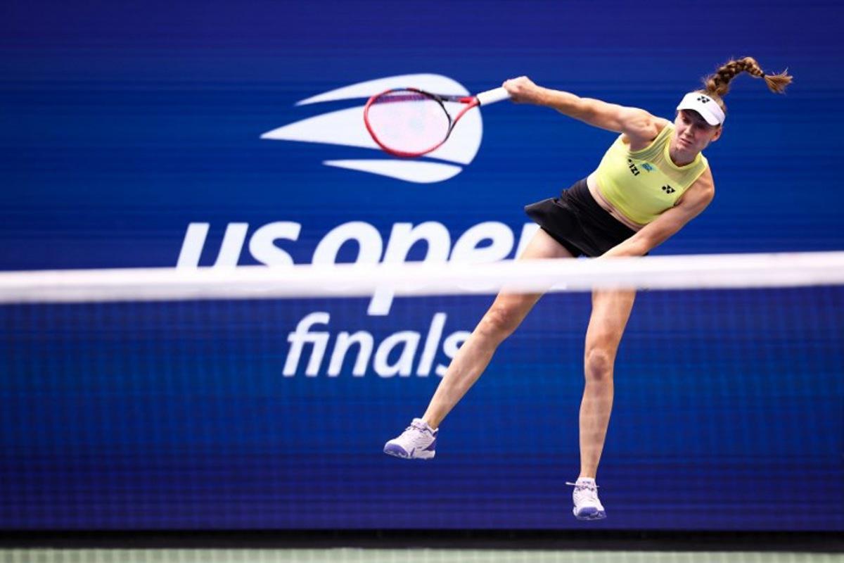 Kazakhstan's Elena Rybakina serves against Belarus's Aryna Sabalenka during the women's singles final tennis match on day fourteen of the US Open tennis tournament at the USTA Billie Jean King National Tennis Center in New York City on September 12, 2026. CHARLY TRIBALLEAU / AFP