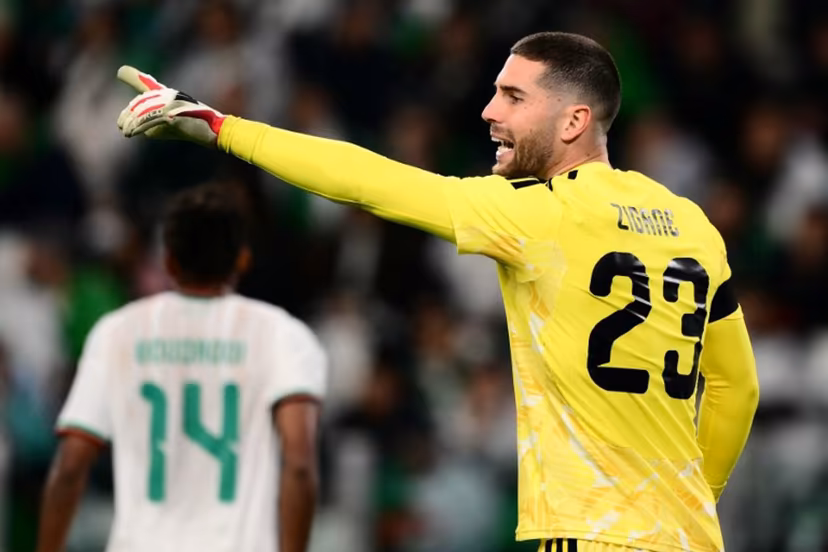 Algeria's goalkeepers #23 Luca Zidane (R) gestures during the friendly international football match between Algeria and Uruguay at the Allianz Stadium in Turin on March 31, 2026. MARCO BERTORELLO / AFP