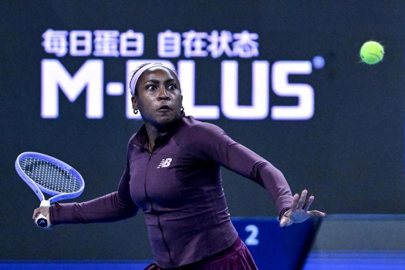 USA's Coco Gauff hits a return to China's Sun Xinran during their women's singles match at the China Open tennis tournament in Beijing on October 5, 2026. ADEK BERRY / AFP