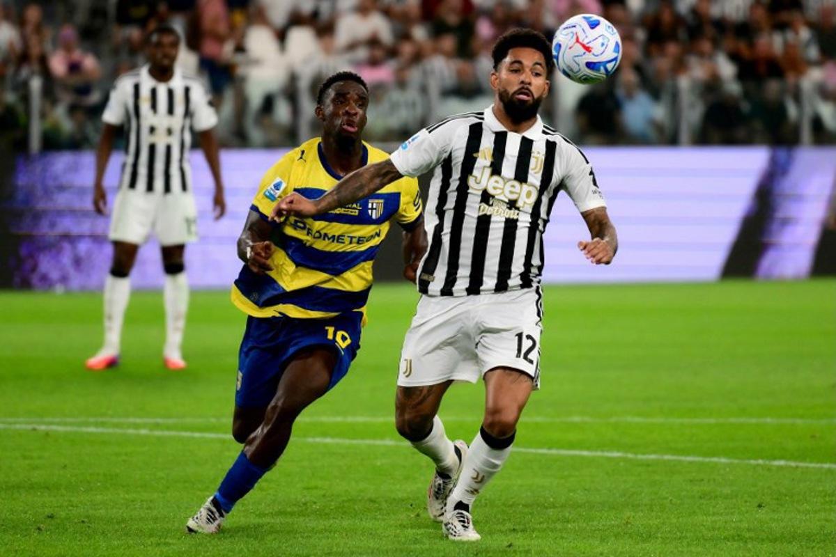 Juventus' Brazilian midfielder #12 Douglas Luiz (R) fights for the ball with Parma's Ivorian midfielder #16 Mandela Keita (L) during the Italian Serie A football match between Juventus and Parma at the Allianz Stadium in Turin, on August 29, 2026. Marco Bertorello / AFP
