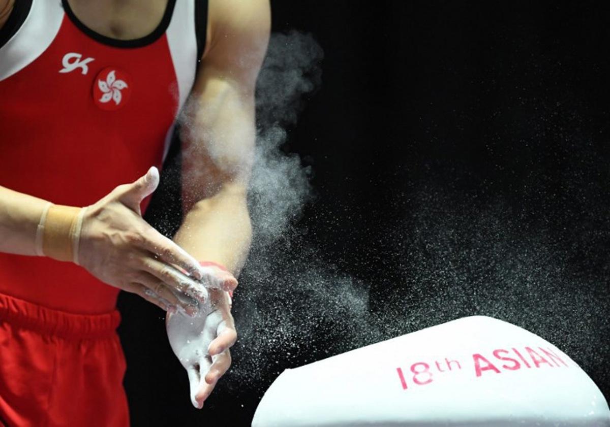 Hong Kong's Shek Wai Hung competes in the men's vault competition in the final of the artistic gymnastics event during the 2018 Asian Games in Jakarta on August 24, 2018. PETER PARKS / AFP