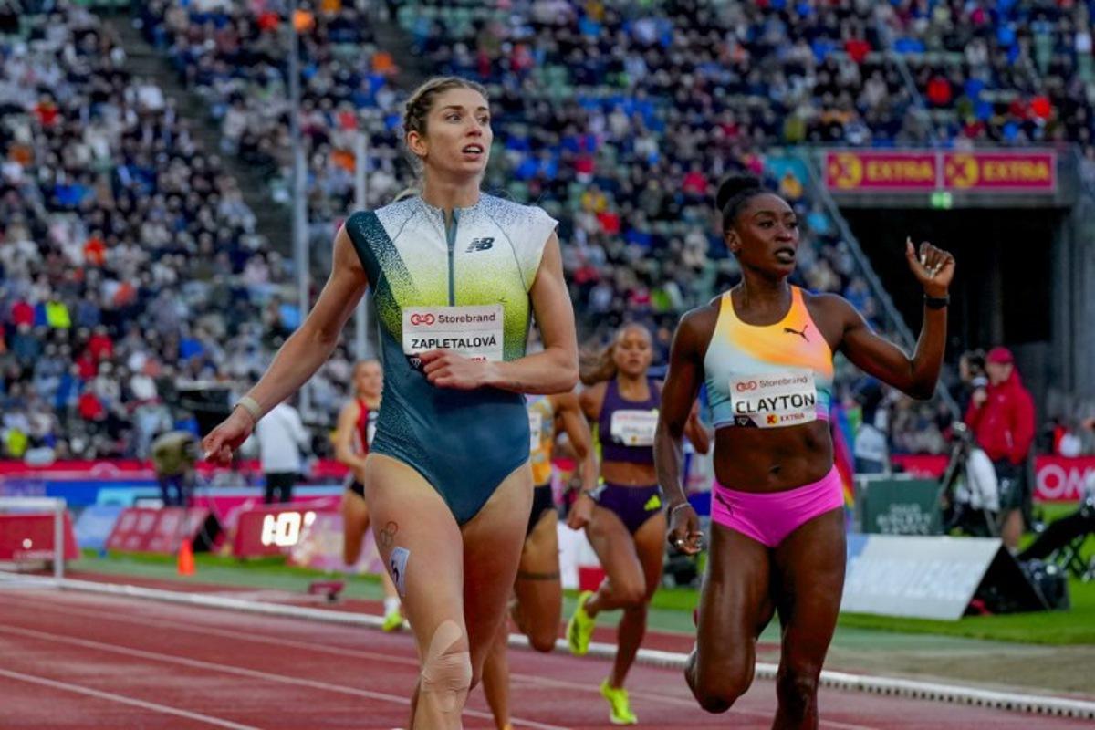 Slovakia's Emma Zapletalova (L) celebrates winning ahead of Jamaica's Rushell Clayton in the Women's 400m Hurdles event of the Olso Diamond League athletics meeting in Oslo, Norway, on June 10, 2026. Heiko Junge / NTB / AFP