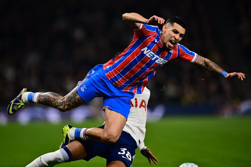 Crystal Palace's Colombian defender #02 Daniel Munoz is tackled by Tottenham Hotspur's Brazilian defender #38 Joao Victor de Souza Menezes during the English Premier League football match between Tottenham Hotspur and Crystal Palace at the Tottenham Hotspur Stadium in London, on March 5, 2026. Ben STANSALL / AFP