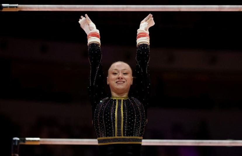 Belgium's Lisa Vaelen competes on the uneven bars during the women's qualifying session at the 53rd FIG Artistic Gymnastics World Championships in Jakarta on October 21, 2025. Yasuyoshi CHIBA / AFP