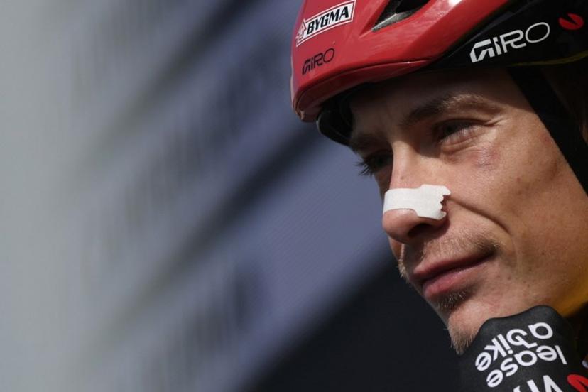 Team Visma - Lease a Bike's Danish rider Jonas Vingegaard looks on as he waits for the start of the 5th stage of the Paris-Nice cycling race, 206.3 km between Cormoranche-sur-Saône and Colombier-le-Vieux, on March 12, 2026. Anne-Christine POUJOULAT / AFP