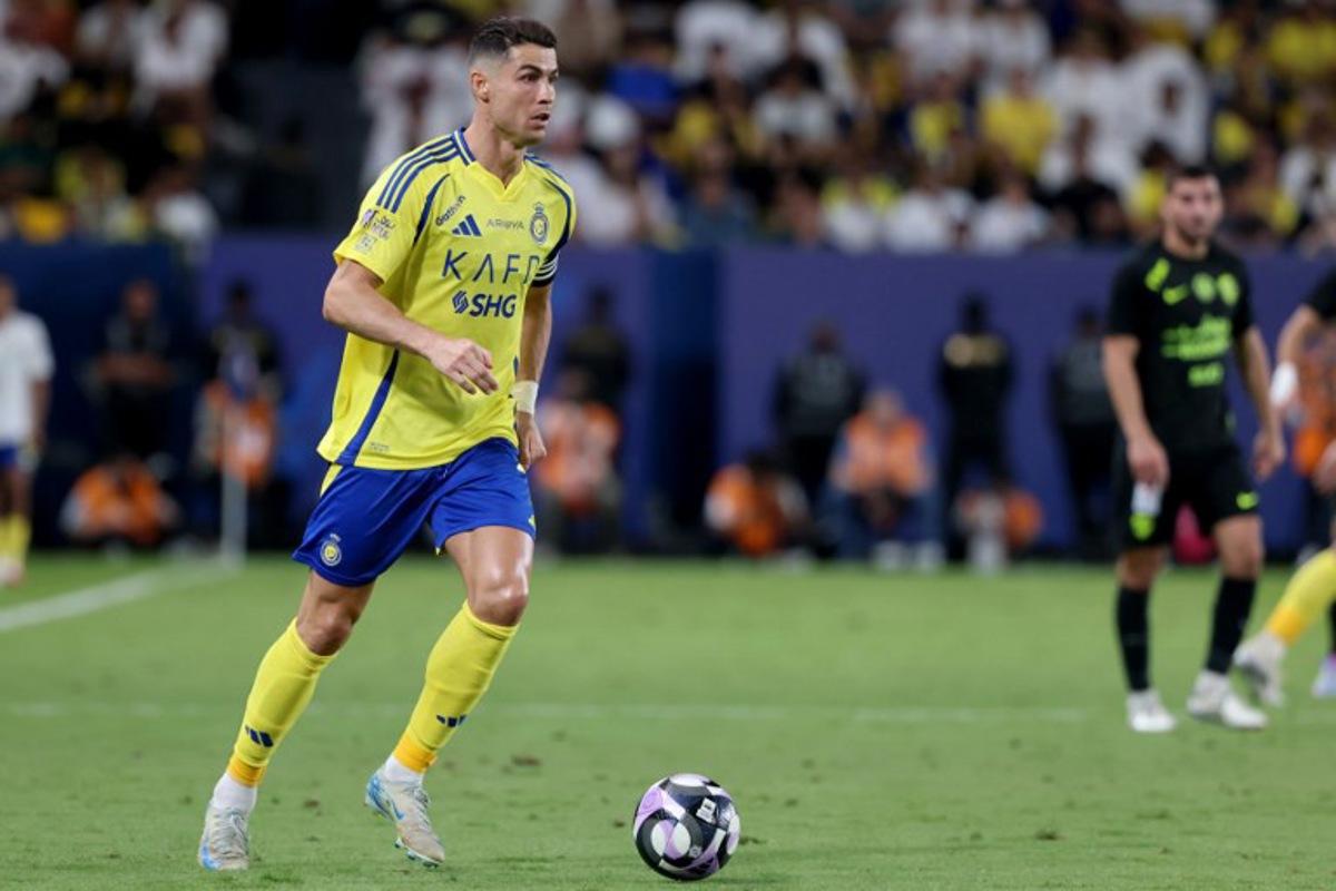 Nassr's Portuguese forward #7 Cristiano Ronaldo looks to pass during the Saudi Pro League football match between Al-Nassr and Al-Ittihad at Al-Awwal Park in Riyadh on May 7, 2025. Fayez NURELDINE / AFP