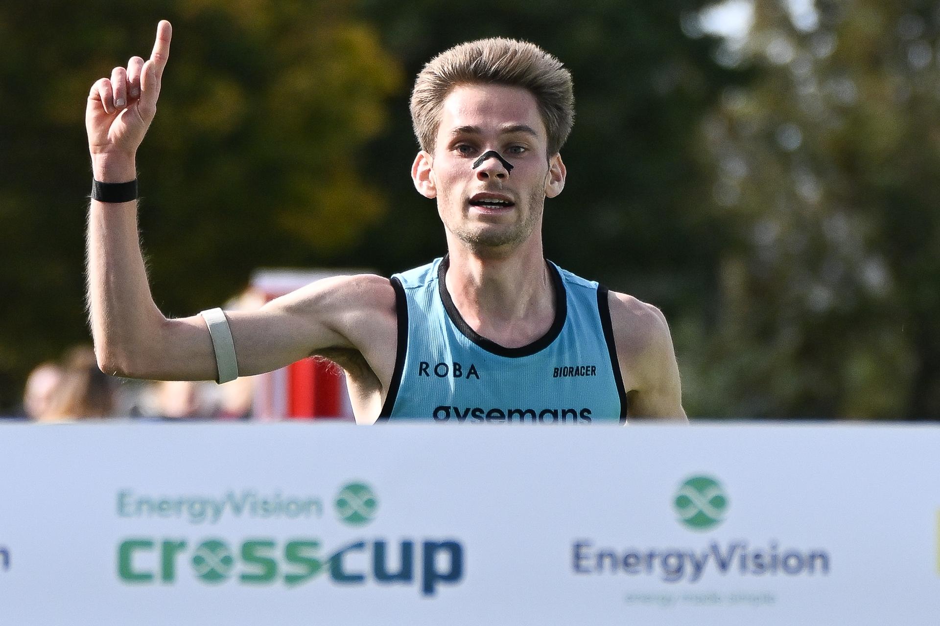Belgian Yorick Van De Kerkhove celebrates as he crosses the finish line to win the men's race at the CrossCup cross country running athletics event in Roeselare on Sunday 25 October 2026. BELGA PHOTO ELIAS ROM