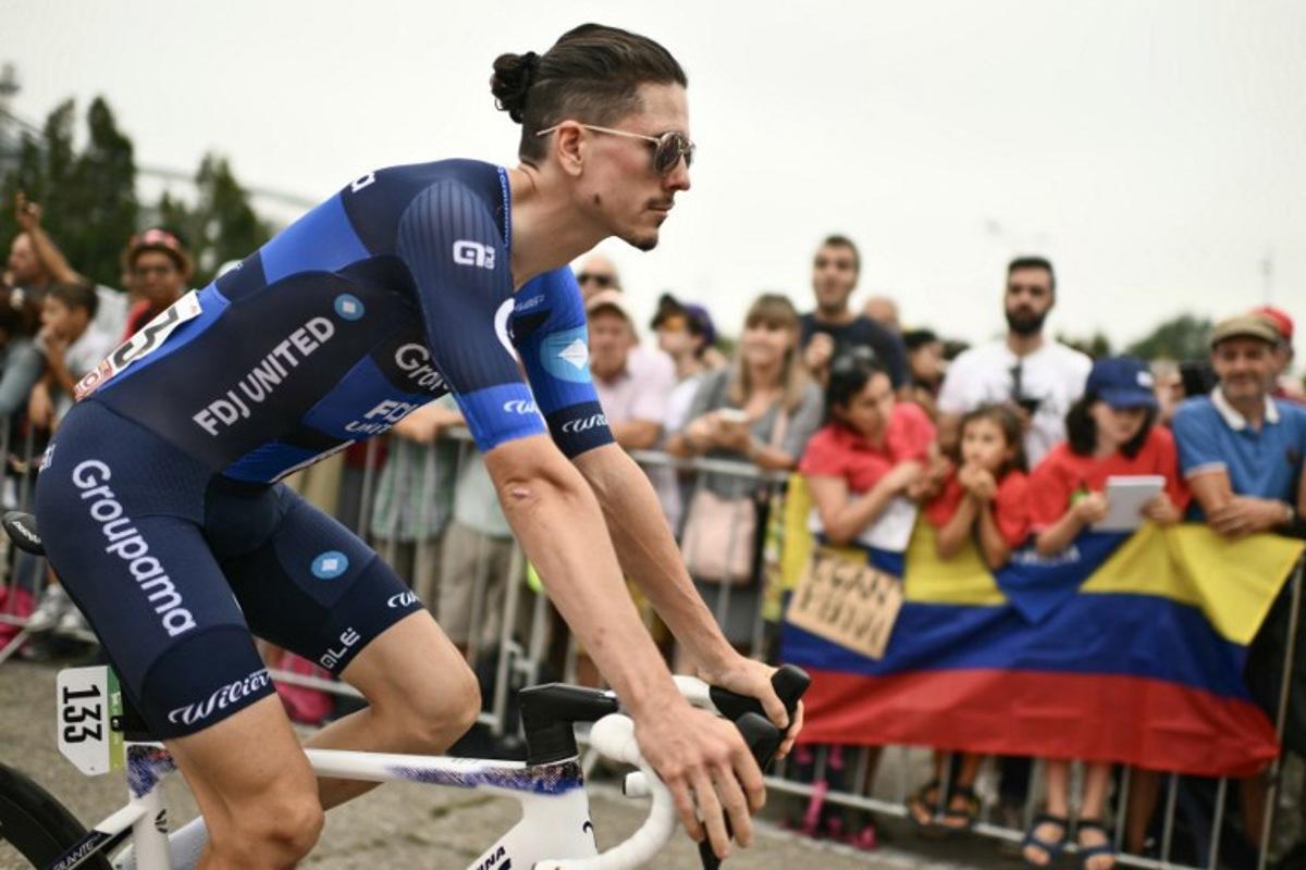 Team Groupama-FDJ's French rider David Gaudu arrives to compete in the second stage of the Vuelta a Espana, a 159,6 km race between Alba and Limone Piemonte, in Italy's Piemonte region, on August 24, 2025. Marco BERTORELLO / AFP