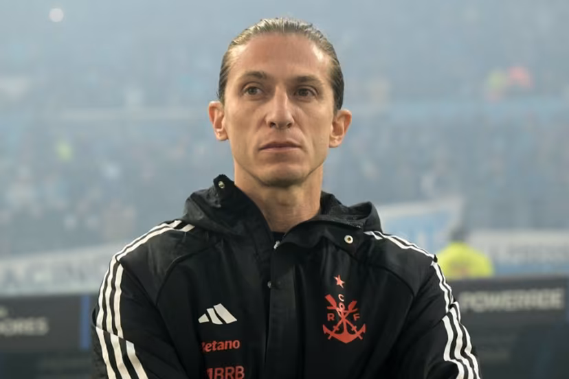 Flamengo's head coach Filipe Luis looks on ahead of the Copa Libertadores semifinal second leg football match between Argentina's Racing and Brazil's Flamengo at the Presidente Juan Domingo Peron - El Cilindro stadium in Avellaneda, Buenos Aires province, on October 29, 2025. JUAN MABROMATA / AFP