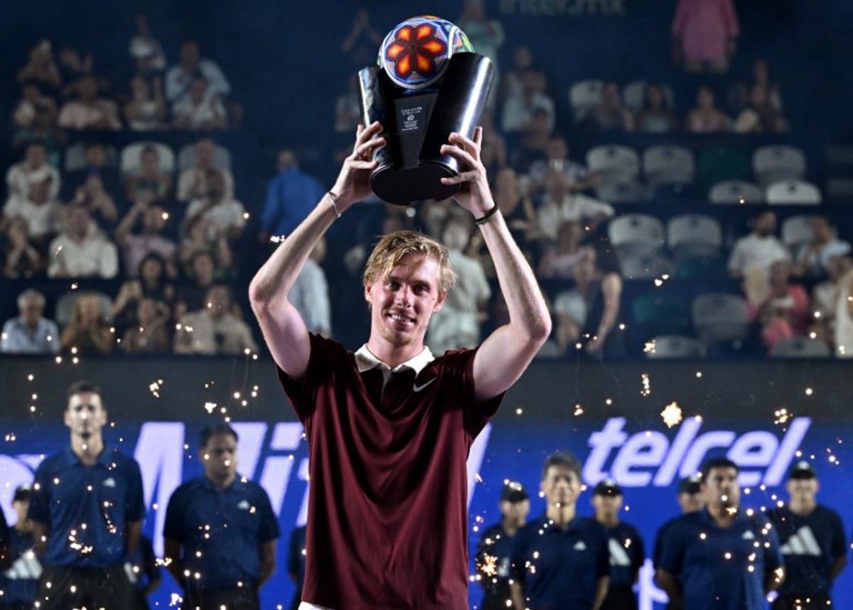 Canada's Denis Shapovalov celebrates with his trophy after defeating US' Aleksandar Kovacevic during the Mexico ATP Open men's singles tennis final match at the Cabo Sports Complex in Los Cabos, Baja California, Mexico, on July 19, 2025. Alfredo ESTRELLA / AFP