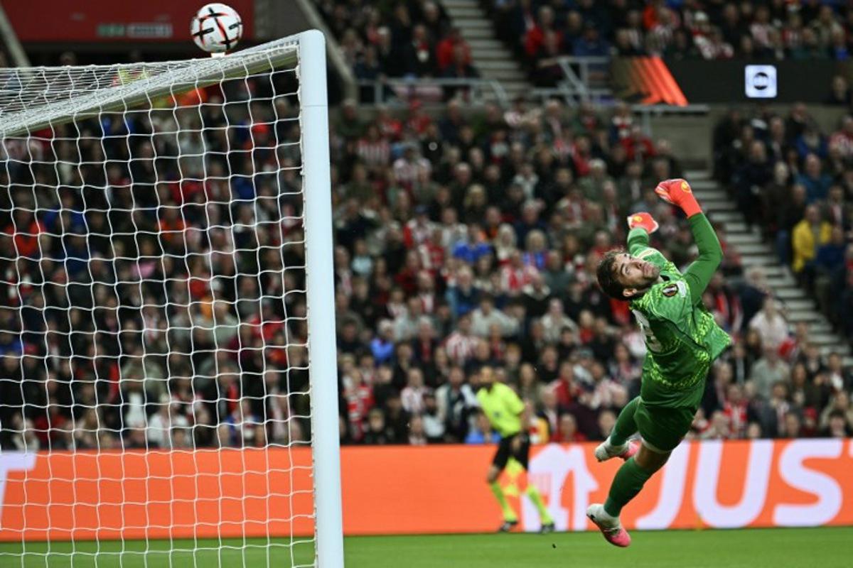 AZ's Belgian goalkeeper #28 Jari De Busser eyes the ball as it goes over the bar during the UEFA Europa League, 1st round day 1 football match between Sunderland and AZ Alkmaar at The Stadium of Light in Sunderland in north east England on September 16, 2026. ANDY BUCHANAN / AFP