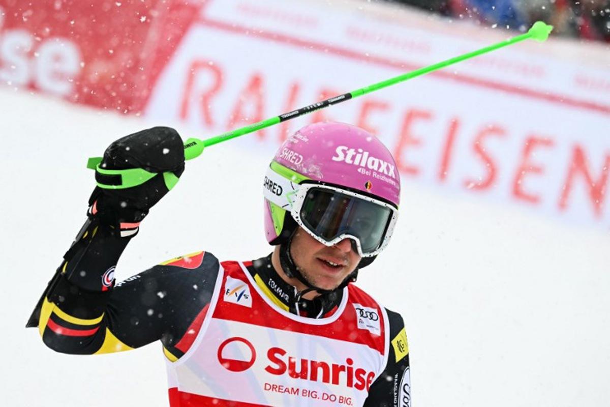 Belgium's Sam Maes reacts as he crosses the finish line in the second run of the Men's Giant Slalom, part of the FIS Alpine Ski World Cup 2025-2026 in Adelboden, soutwestern Switzerland on January 10, 2026. Fabrice COFFRINI / AFP