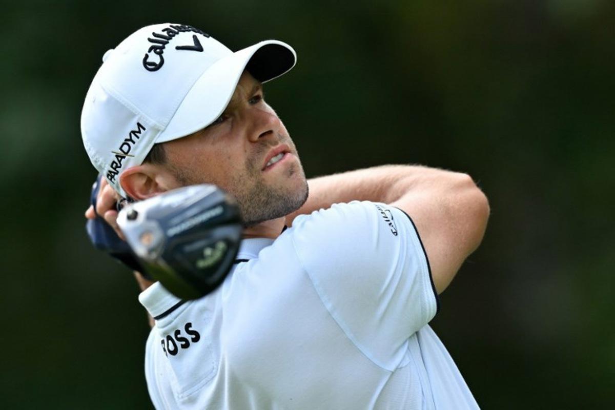 Belgium's Thomas Detry watches his drive from the 13th tee on day three of the BMW PGA Championship at Wentworth Golf Club, south-west of London, on September 16, 2023. Glyn KIRK / AFP