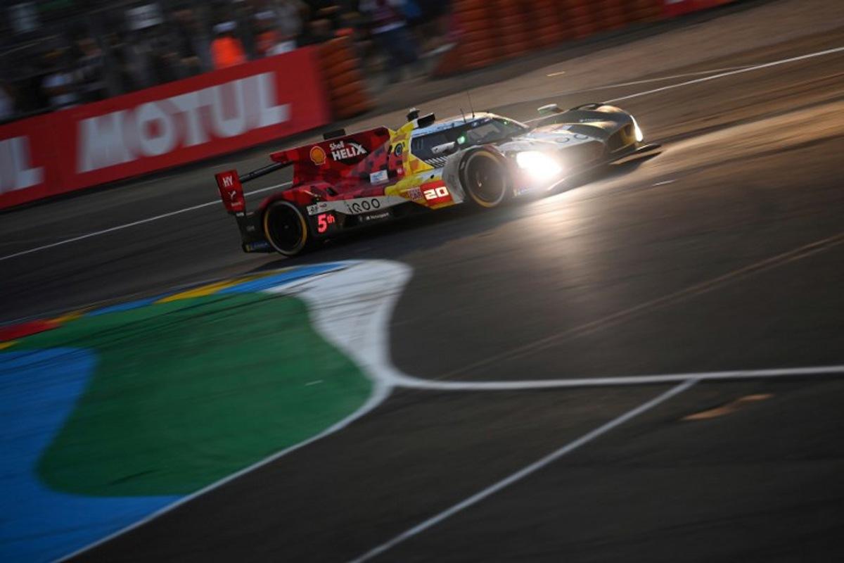BMW M Team WRT's German driver #20 Rene Rast steers his hypercar during the 2025 Le Mans 24 hour endurance race, at the Le Mans circuit, in north-western France on June 14, 2025. JEAN-FRANCOIS MONIER / AFP
