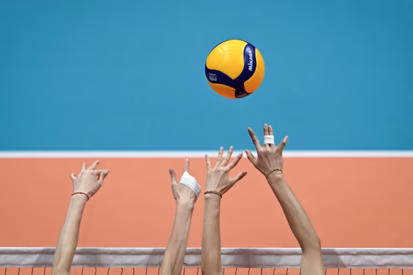 China's players attempt to block a ball in the women's gold medal volleyball event against Japan during the Hangzhou 2022 Asian Games in Hangzhou, in China's eastern Zhejiang province on Octorber 7, 2023. WANG Zhao / AFP