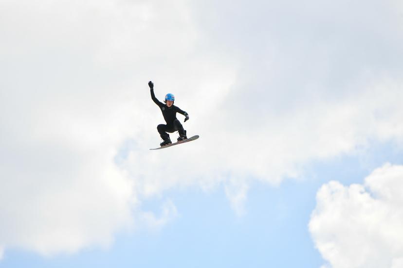 Belgian snowboarder Ward Van Tittelboom (Intensive Rookie Program) pictured in action during the opening of a large dry slope by Flemish minister Weyts, Sport Vlaanderen, the city of Genk and Snow Sports Vlaanderen, in Genk, Saturday 26 June 2021. In a technical sport with very complex movements, the snowboarders and their staff have to look for conditions that allow to perform many repetitions in safe conditions. The dry slope with airbag in Genk makes it possible to train in winter and summer, regardless of the presence of snow. On a track with a height of 34 meters, a length of 62 meters, a slope of 30 degrees and an adjustable 'kicker' (dismount), the riders can imitate every 'Big Air jump' in the world. BELGA PHOTO BERNARD GILLET