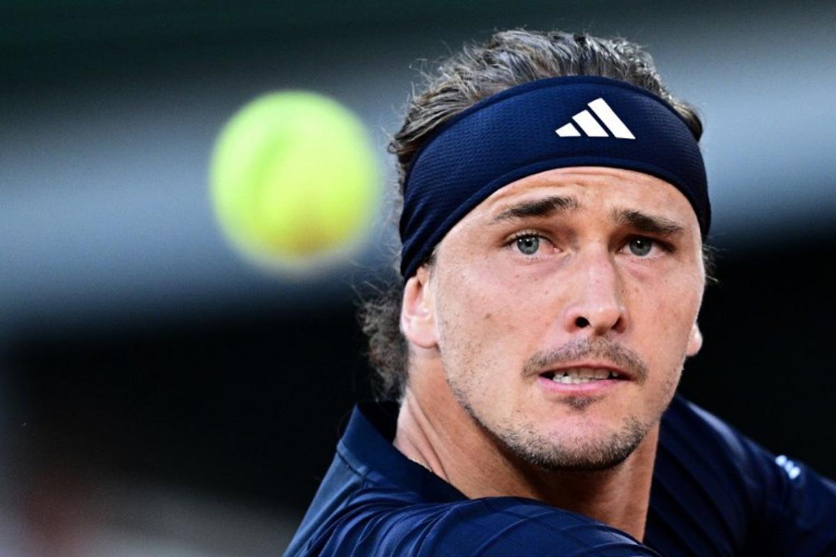Germany's Alexander Zverev eyes the ball as he plays against Czech Republic's Tomas Machac during their men's singles match on day 4 of the French Open tennis tournament on Court Philippe-Chatrier at the Roland-Garros Complex in Paris on May 27, 2026. JULIEN DE ROSA / AFP