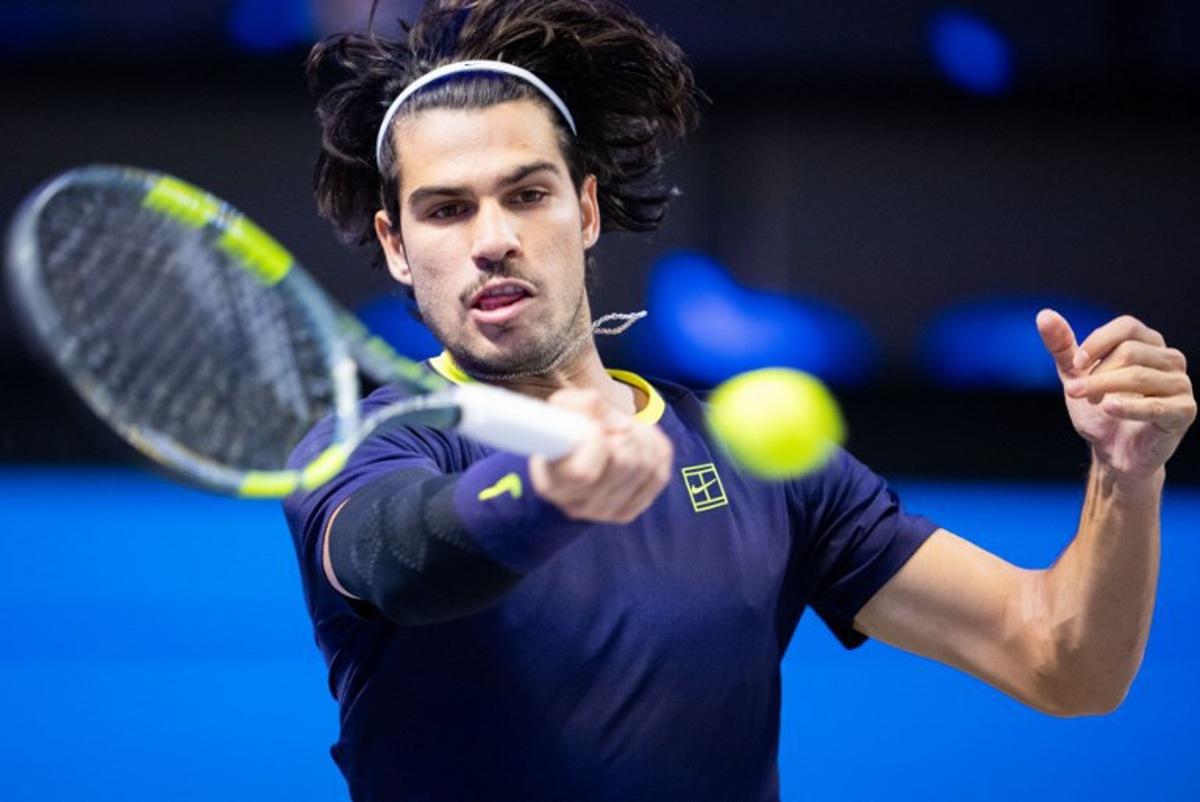 Spain's Carlos Alcaraz returns the ball to USA's Tommy Paul (not pictured) during the quarter-final match at the Erste Bank Open 2026 ATP 500 tennis tournament in Vienna, Austria, on October 30, 2026. GEORG HOCHMUTH / APA / AFP