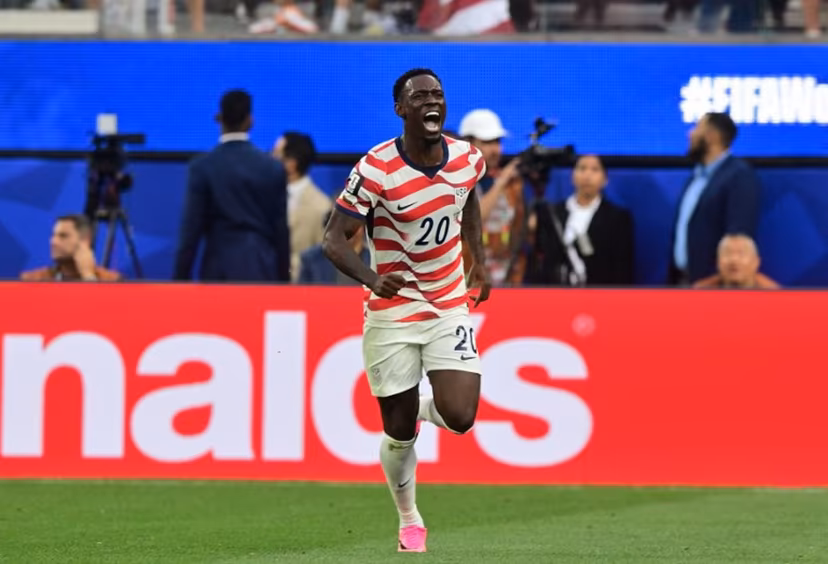 US forward #20 Folarin Balogun celebrates scoring his team's second goal during the 2026 World Cup Group D football match between USA and Paraguay at the Los Angeles Stadium in Inglewood on June 12, 2026. Frederic J. BROWN / AFP
