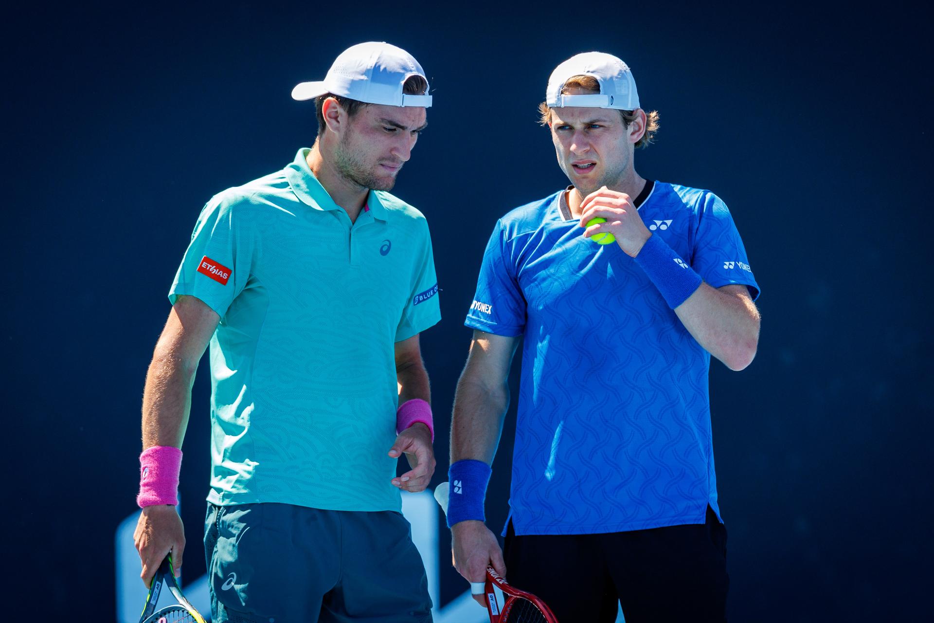 Belgian Raphael Collignon, Belgian Zizou Bergs and pictured during a first round match of Belgium's Bergs/Collignon against Australia's pair McCabe/Tu in the men doubles at the Australian Open, Melbourne Park, Melbourne on Wednesday 21 January 2026. McCabe/Tu won the game. BELGA PHOTO PATRICK HAMILTON --- BENELUX ONLY ---